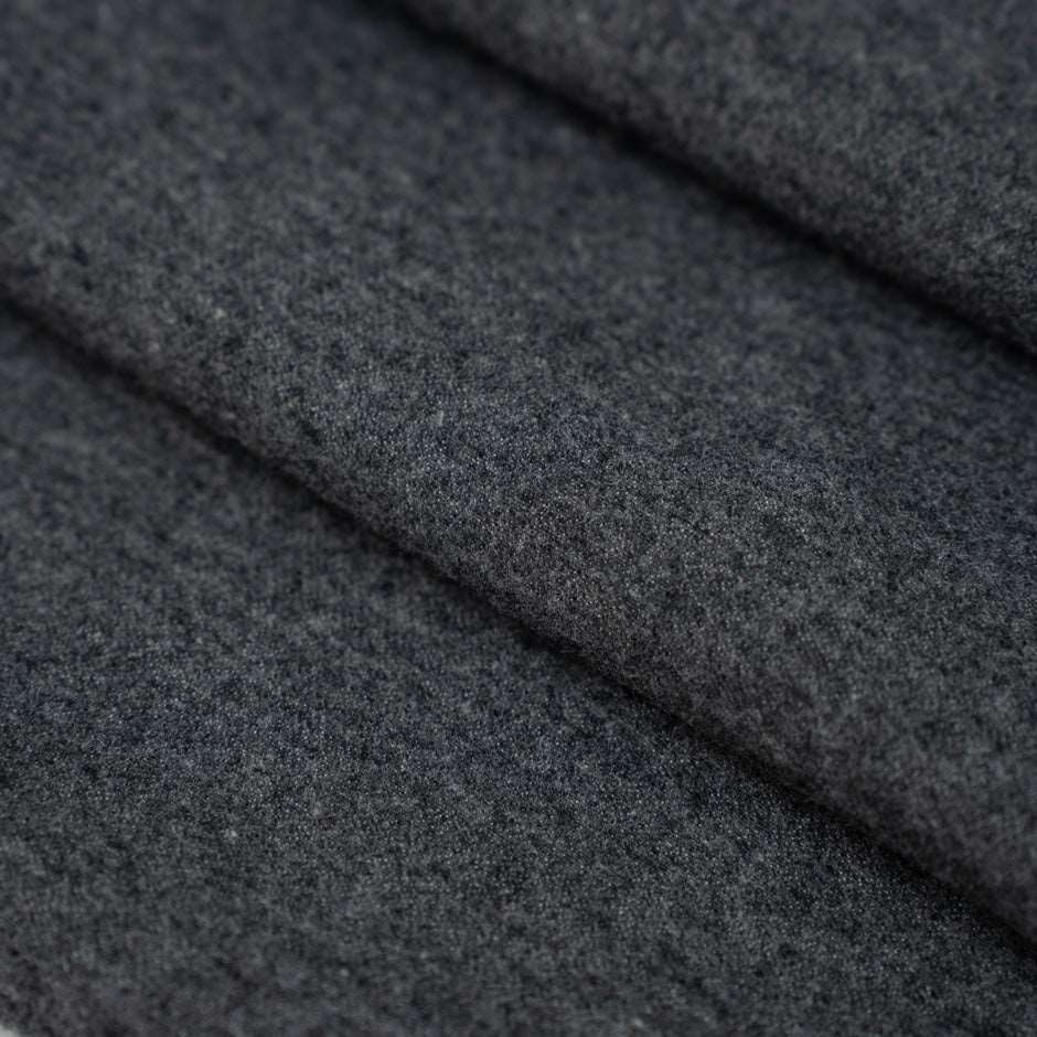 Dark gray colored heavy and falling cotton flannel. &amp;nbsp;High-quality deadstock fabric collected in Stock from a Maison de Couture in Italy.