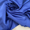 Solid color china blue polyester satin. High quality deadstock fabric picked up in Stock from a Maison de Couture in Italy.