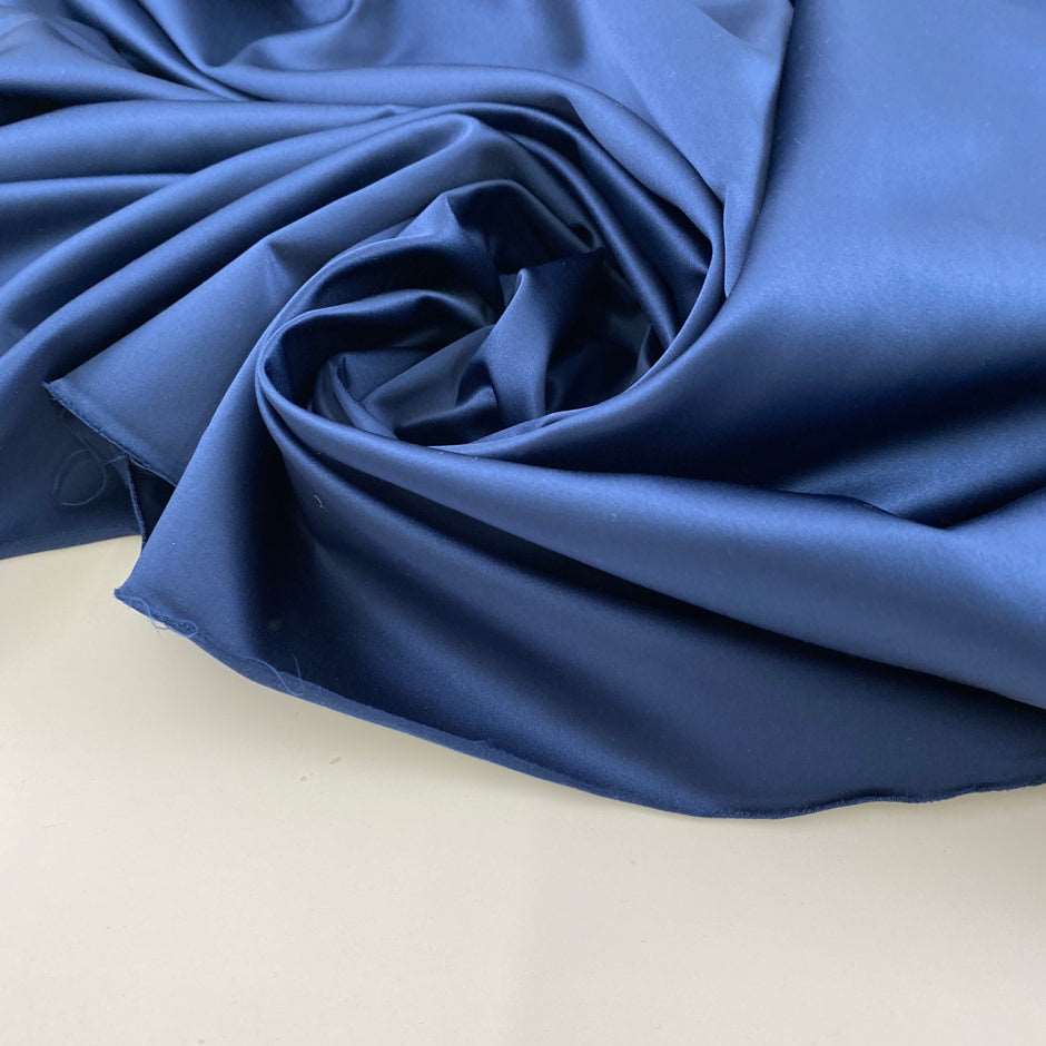 Blue gray polyester satin.