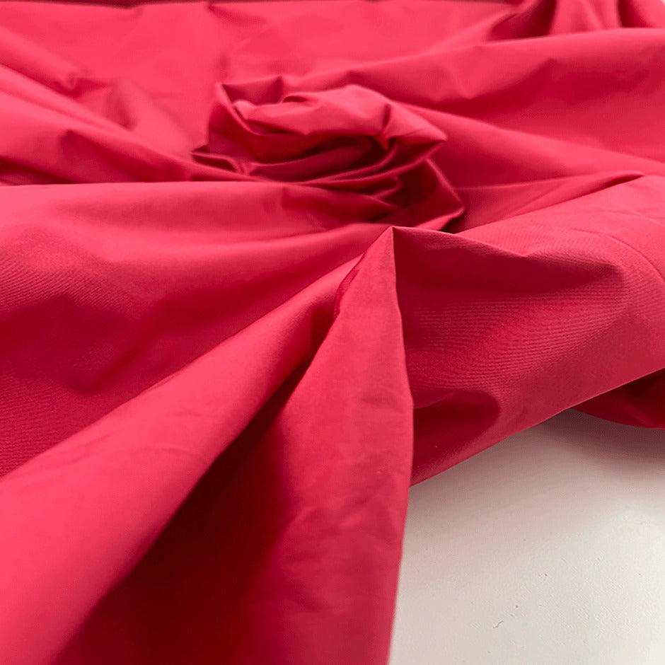 Crisp polyester tafta, solid color. High quality deadstock fabric picked up in Stock from a Maison de Couture in Italy.