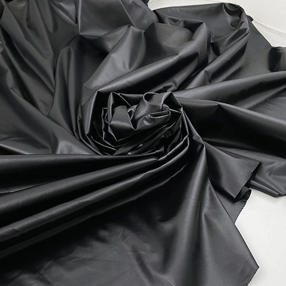 Fluid ecological fabric solid color imitation leather. High quality deadstock fabric picked up in Stock from a Maison de Couture in Japan.