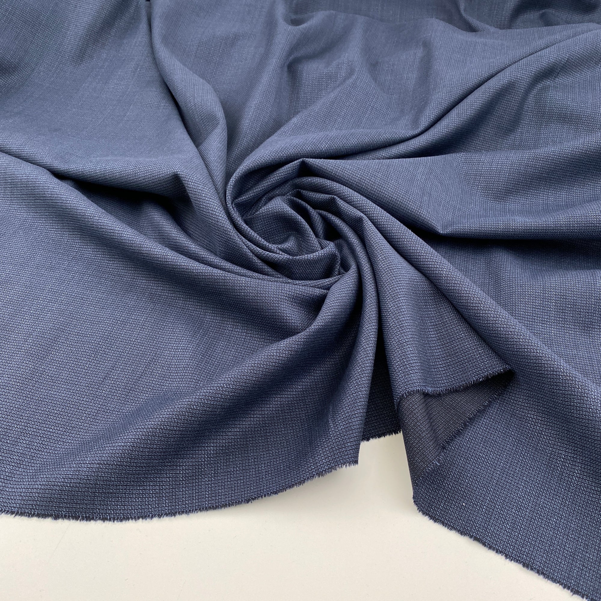 Pure virgin wool grisaille soft and blue. High-quality deadstock fabric collected in Stock from a Maison de Couture in Italy.