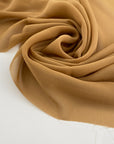 Flowing and drooping beige solid color silk georgette