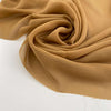 Flowing and drooping beige solid color silk georgette