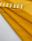 Flowing and falling transparent fabric in solid yellow silk . Picked up in Stock from a Maison de Couture in Italy. High quality deadstock fabric.