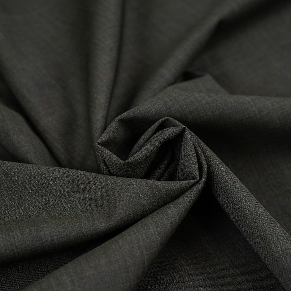 Fresh green falling wool melange. High-quality deadstock fabric collected in Stock from a Maison de Couture in Italy.