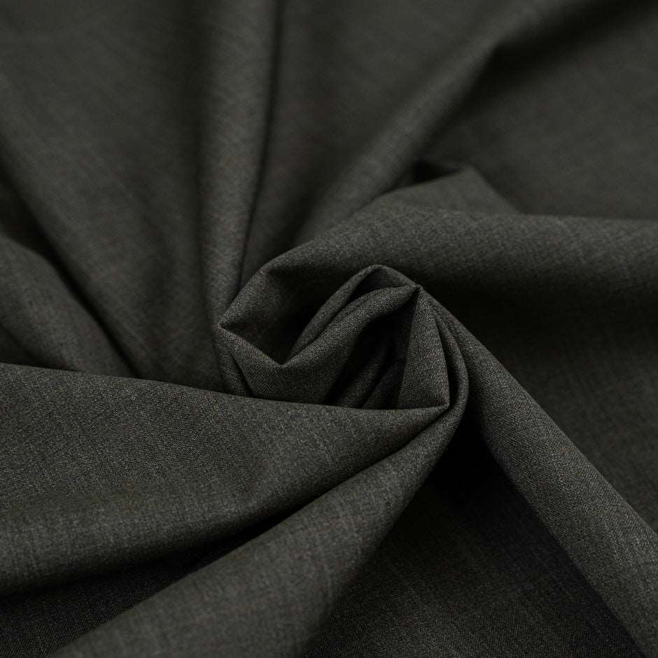 Fresh green falling wool melange. High-quality deadstock fabric collected in Stock from a Maison de Couture in Italy.