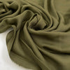 Pure viscose, very soft and light, flowy in avocado green. Ideal for shirts, skirts, dresses, and blouses. High-quality deadstock fabric by the meter collected in Stock from a Maison de Couture in Italy.
