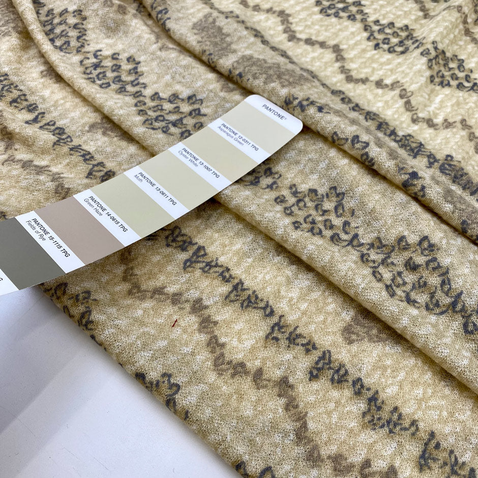 Very light pure wool jersey stretch with ethnic design in yellow and beige shades. Very soft and warm. High-quality deadstock fabric collected in Stock from a Maison de Couture in Italy.