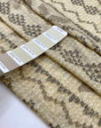 Very light pure wool jersey stretch with ethnic design in yellow and beige shades. Very soft and warm. High-quality deadstock fabric collected in Stock from a Maison de Couture in Italy.