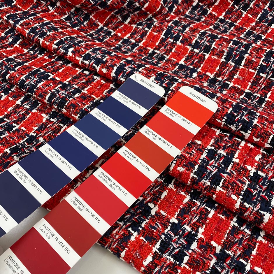 Mixed wool, cotton, and polyester tweed with checks in red, blue, and white shades. Very soft and light. High-quality deadstock fabric by the meter collected in Stock from a Maison de Couture in Italy.