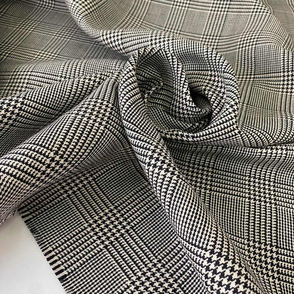 Soft and warm pure wool in a classic black and white Prince of Wales check. Perfect for light coats, jackets, or winter skirts.
High-quality deadstock collected in Stock from a Maison de Couture in Italy.