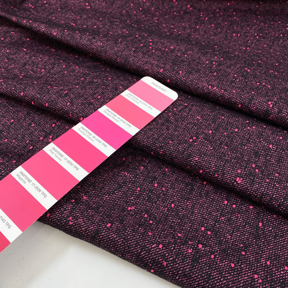 Soft and warm wool blend in vibrant fuchsia and black tones. A bold and cozy choice for coats, jackets, or winterwear.High-quality deadstock collected in Stock from a Maison de Couture in Italy.