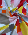Multicoloured geometric print cotton poplin, soft and non-stretch, perfect for shirts. High-quality deadstock collected in Stock from a Maison de Couture in Italy.&nbsp;