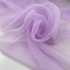 Lilac polyester organza very light and transparent, soft and flowy. High-quality deadstock fabric collected in Stock from a Maison de Couture in Italy.