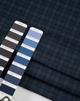 Punto Milano double-face viscose polyester. The fabric is squared printed, stretch, blue and black. High-quality deadstock collected in Stock from a Maison de Couture in Italy.