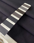 Soft and flowy stretch wool in dark gray. Comfortable and versatile, ideal for trousers, dresses, skirts, and jackets.High-quality deadstock collected in Stock from a Maison de Couture in Italy.