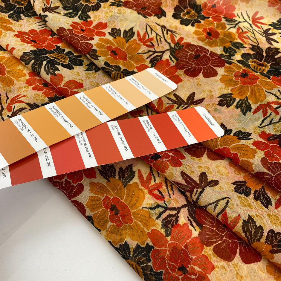 Polyester and lurex chiffon in orange and red shades. Very soft, flowy and, transparent. High-quality deadstock fabric by the meter collected in Stock from a Maison de Couture in Italy.