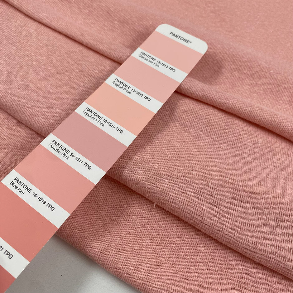Stretch cotton and linen jersey in pink color reference English Rose. Very flowy and soft with a rough texture. Ideal for t-shirts, sweatshirts, dresses, skirts, and trousers. High-quality deadstock collected in Stock from a Maison de Couture in Italy.
