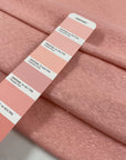 Stretch cotton and linen jersey in pink color reference English Rose. Very flowy and soft with a rough texture. Ideal for t-shirts, sweatshirts, dresses, skirts, and trousers. High-quality deadstock collected in Stock from a Maison de Couture in Italy.