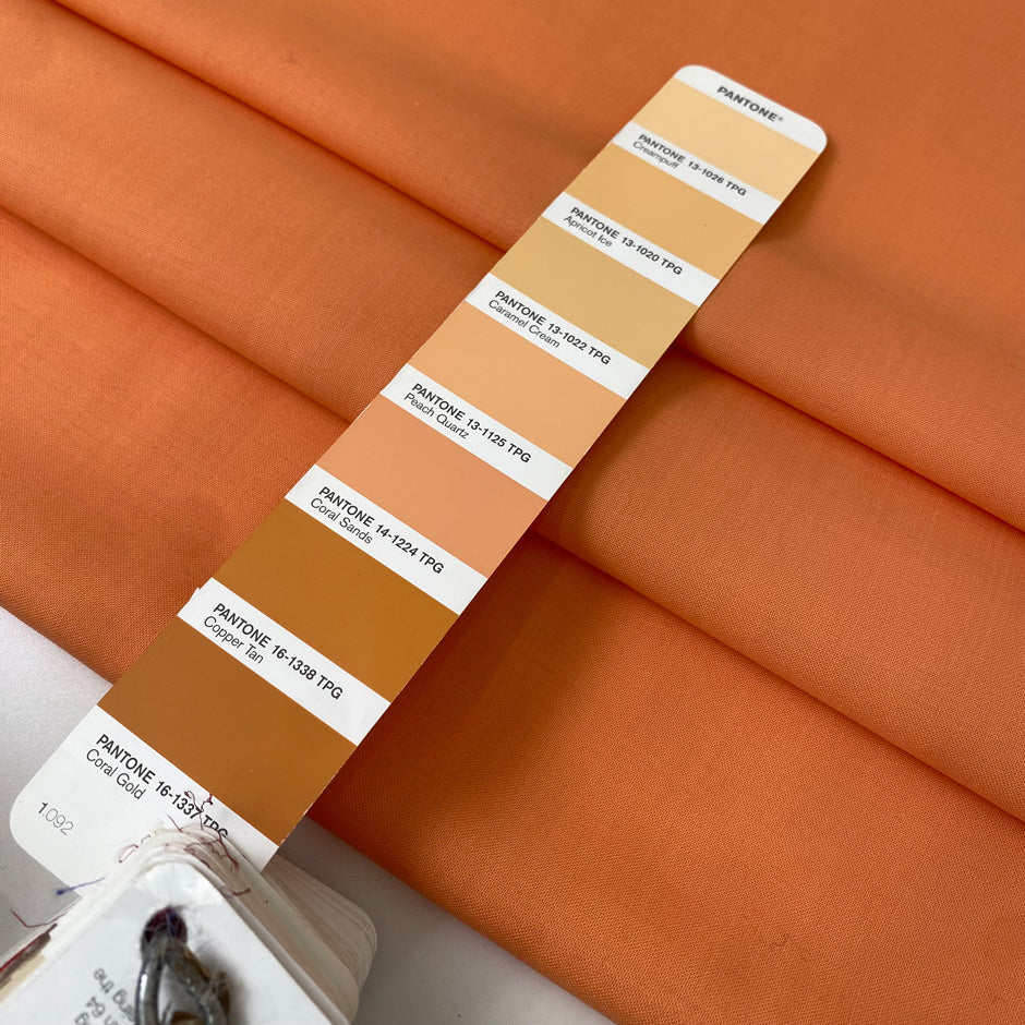 Light wool stretch in orange color reference Copper Tan. Very soft and light, flowy and not transparent. Ideal for dresses, trousers, skirts, and blouses. High-quality deadstock collected in Stock from a Maison de Couture in Italy.
