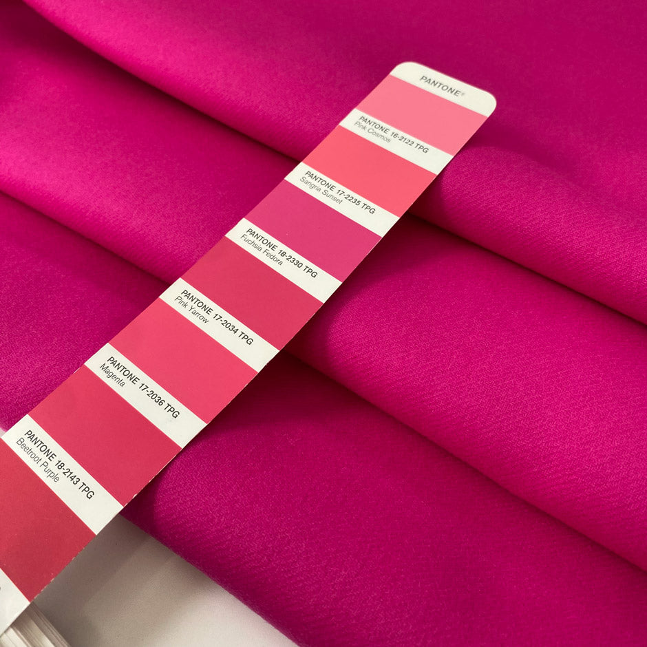 Soft and warm wool and polyester coating in vibrant fuchsia. Perfect for creating stylish coats and jackets.High-quality deadstock collected in Stock from a Maison de Couture in Italy.