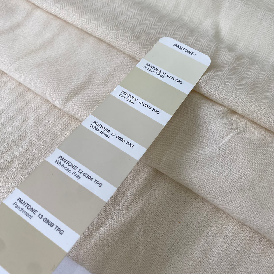 Pure wool pashmina in a soft unbleached cream tone. Very light and delicate, ideal for shawls, scarves, shirting, and dresses. High-quality deadstock collected in Stock from a Maison de Couture in Italy.
