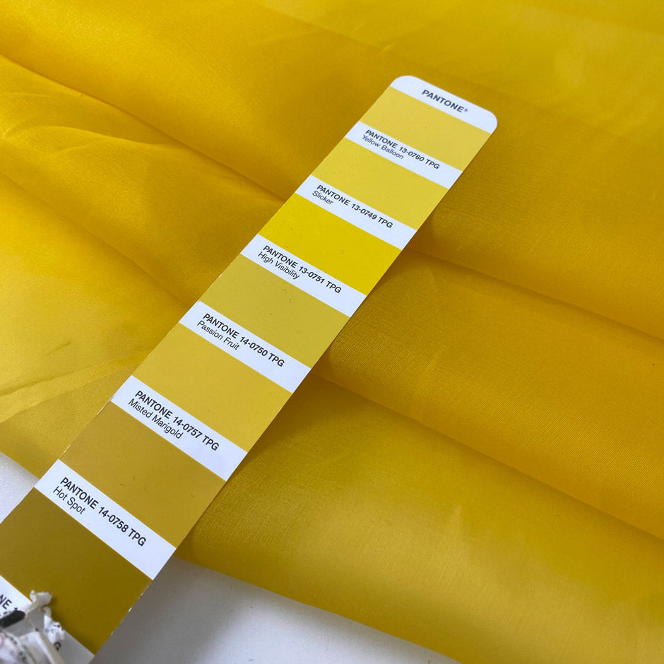 Crisp and luminous yellow pure silk organza. Adds volume and holds shape beautifully. Ideal for shirting, blouses, dresses, and structured skirts.High-quality deadstock collected in Stock from a Maison de Couture in Italy.
