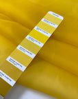 Crisp and luminous yellow pure silk organza. Adds volume and holds shape beautifully. Ideal for shirting, blouses, dresses, and structured skirts.High-quality deadstock collected in Stock from a Maison de Couture in Italy.