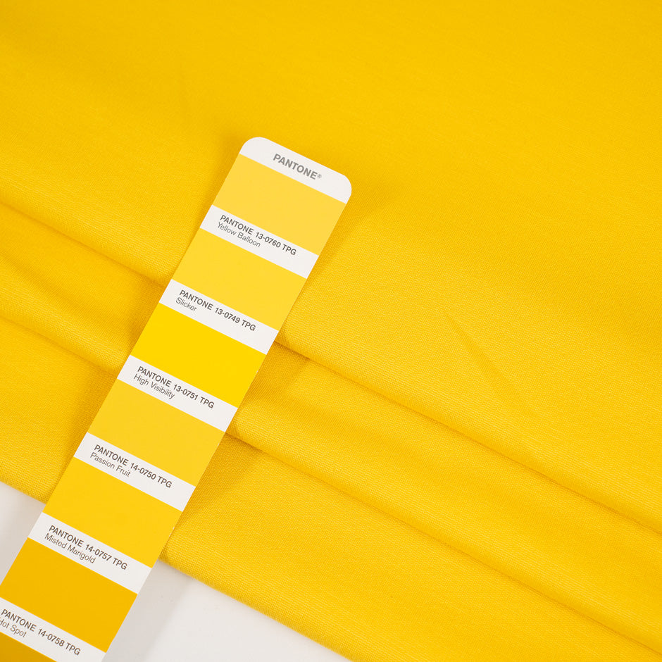 Yellow, stretchy jersey of viscose. High-quality deadstock fabric collected in Stock from a Maison de Couture in Italy.