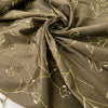 Green silk with floral embroidery and delicate sequins. Slightly stiff, it adds volume and holds shape. Perfect for jackets, dresses, and skirts.High-quality deadstock collected in Stock from a Maison de Couture in Italy.