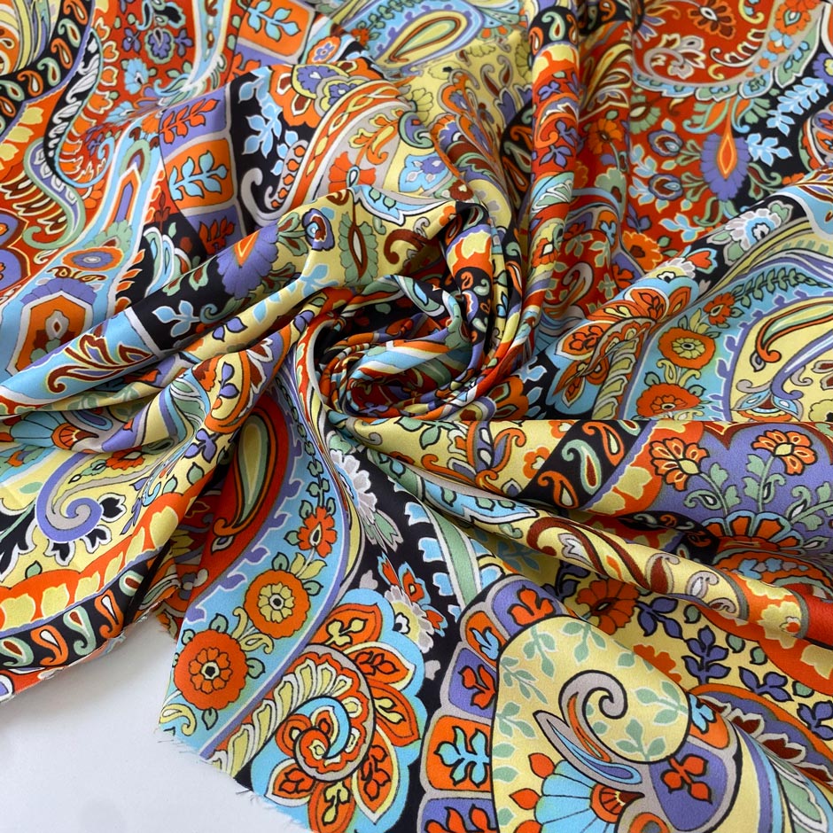 Polyester fabric with multicolor paisley design. Very soft, light and fluid. Ideal for dresses, blouses, skirts and shirting. High-quality deadstock collected in Stock from a Maison de Couture in Italy.