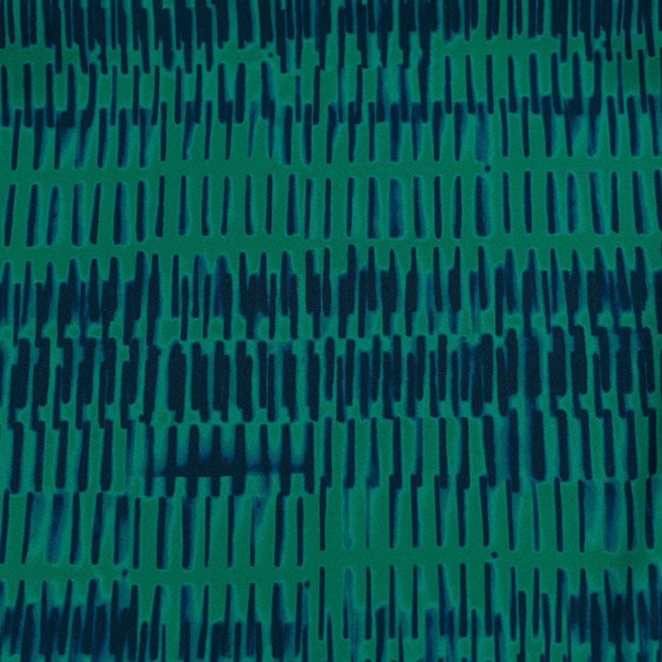 Cady polyester patterned green and blue. High quality deadstock fabric.