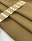 Plain cady stretch viscose in camel color. High-quality deadstock collected in Stock from a Maison de Couture in Italy.