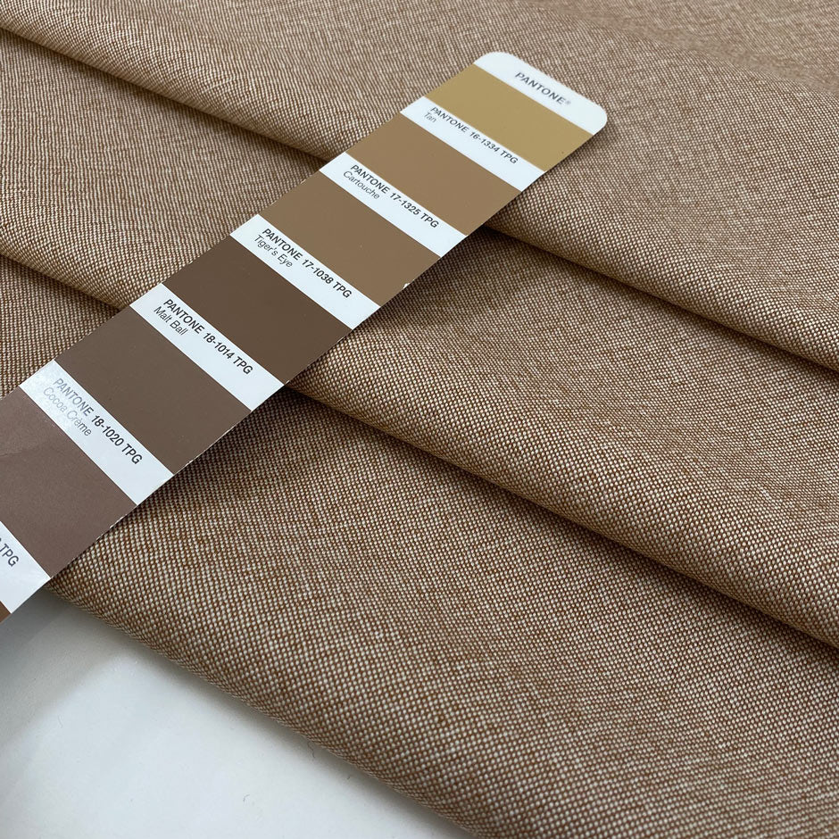 Pure wool light tweed in a tan brown melange. Very soft, medium weight, and not transparent. Ideal for jackets, skirts, or trousers. High-quality deadstock collected in Stock from a Maison de Couture in Italy.