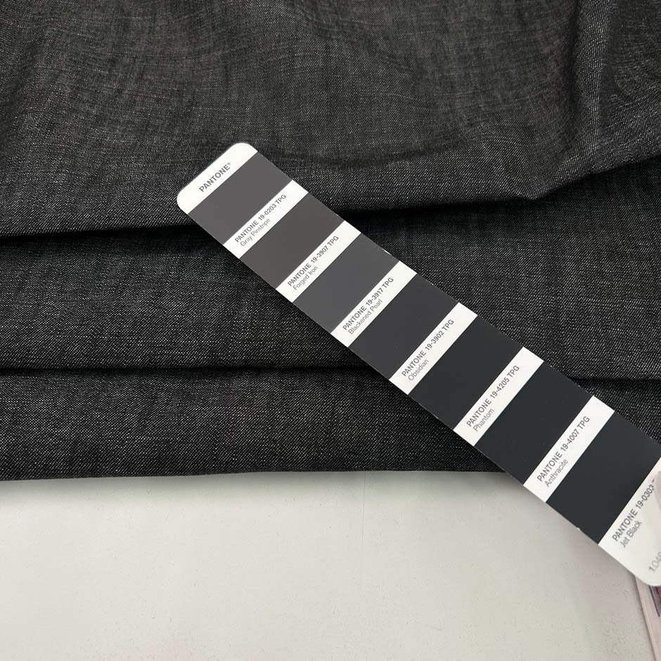 Black melange lightweight cotton denim, soft and non-stretch. Perfect trousers. High-quality deadstock collected in Stock from a Maison de Couture in Italy.