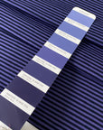 Striped cotton jersey in purple and black, soft and light with a natural stretch. Perfect for t-shirts, dresses, trousers, and skirts. High-quality deadstock collected in Stock from a Maison de Couture in Italy.