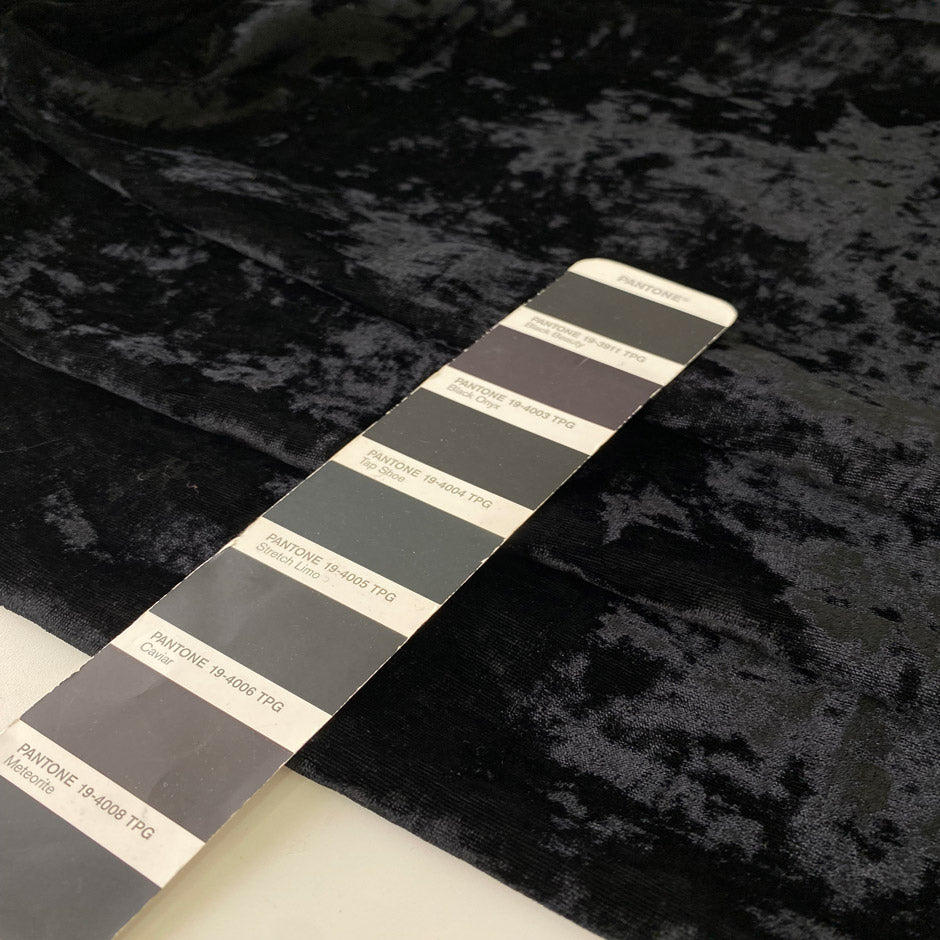 Shiny black velvet in a viscose and polyester blend. Very soft, light, and flowy, yet not transparent. Ideal for dresses, trousers, and skirts. High-quality deadstock collected in Stock from a Maison de Couture in Italy.