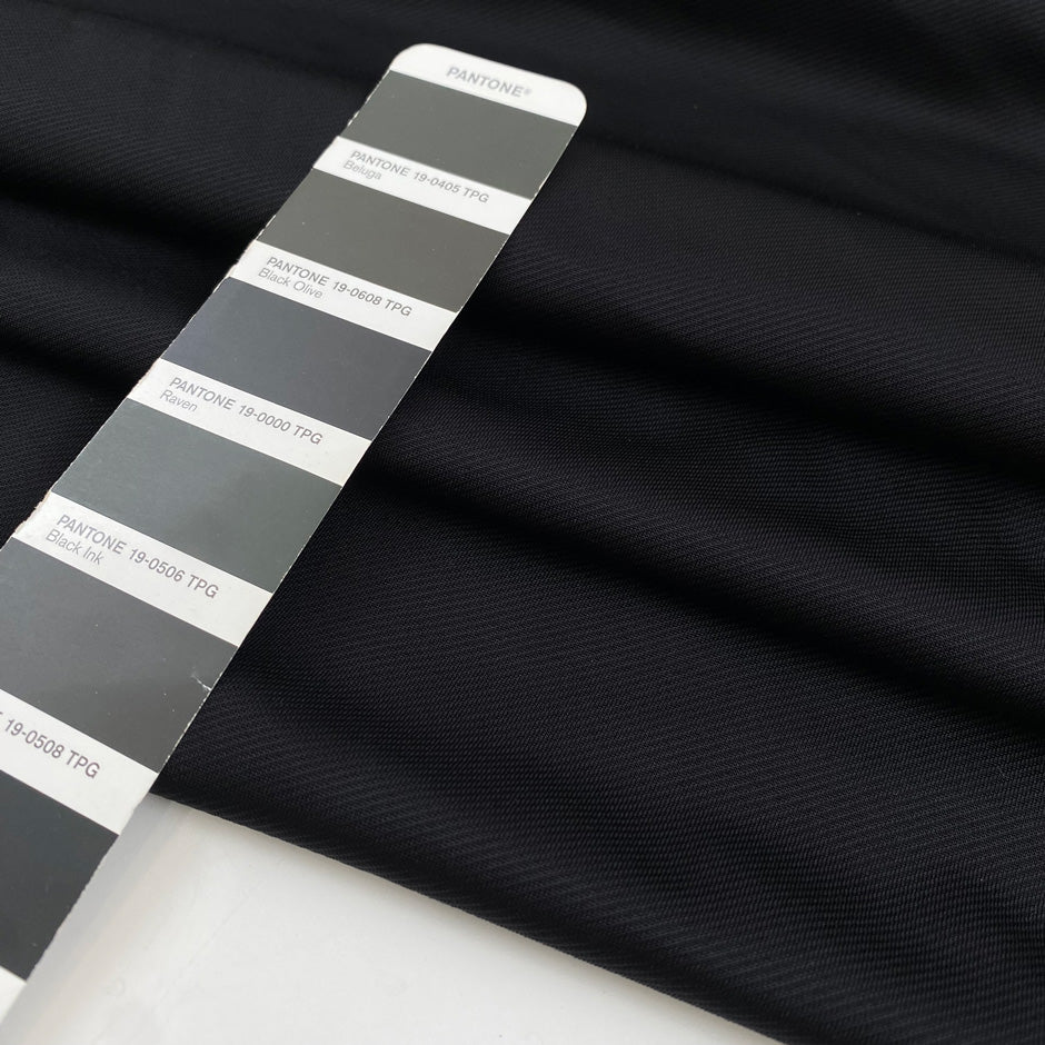 Heavy punto Milano jersey, pure viscose, a little stretch, very flowy in Pirate Black. Ideal for dresses, skirts, and trousers. High-quality deadstock fabric by the meter collected in Stock from a Maison de Couture in Italy.