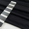 Heavy punto Milano jersey, pure viscose, a little stretch, very flowy in Pirate Black. Ideal for dresses, skirts, and trousers. High-quality deadstock fabric by the meter collected in Stock from a Maison de Couture in Italy.