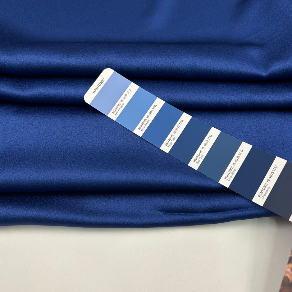 Blue double-face viscose-acetate crepe satin cady, soft, fluid and non-stretch. High-quality deadstock collected in Stock from a Maison de Couture in Italy.