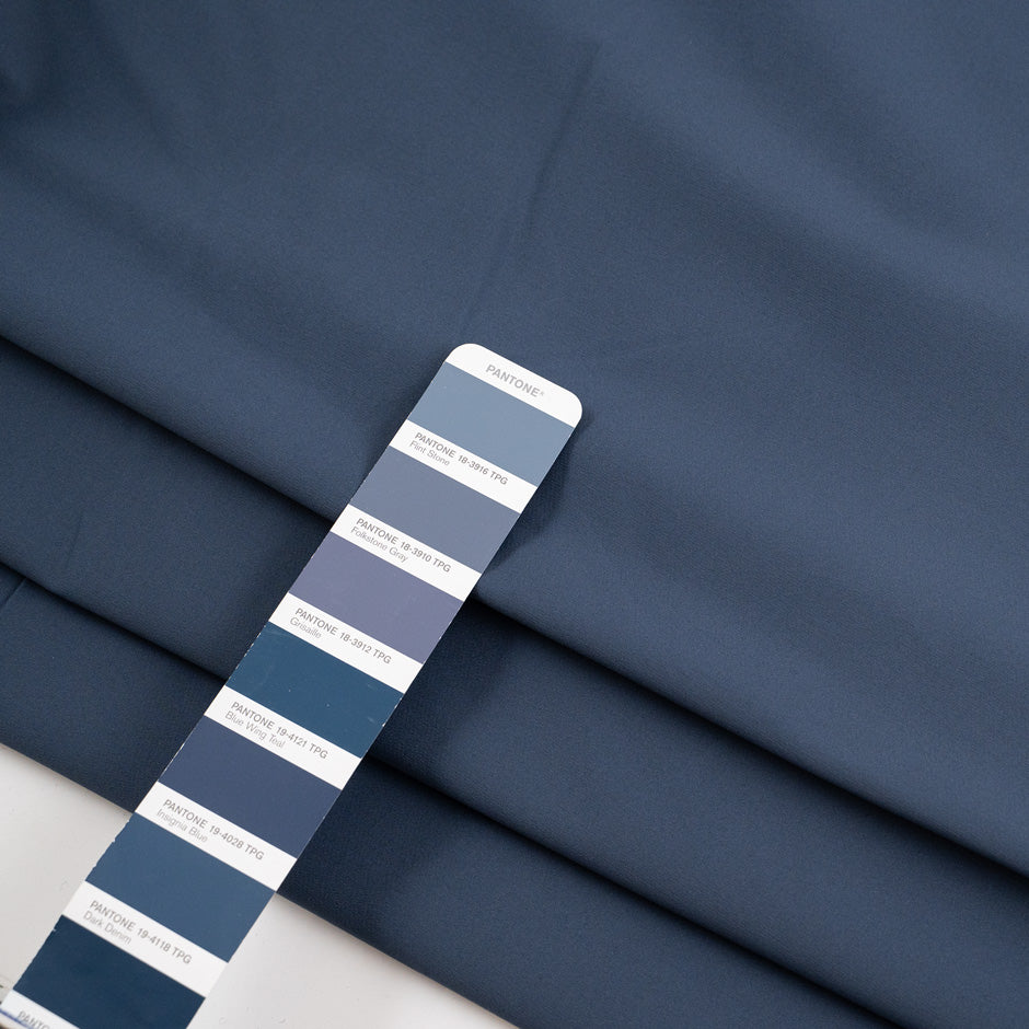 Blue stretch and technical polyester. High-quality deadstock fabric collected in Stock from a Maison de Couture in Italy.