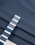 Blue stretch and technical polyester. High-quality deadstock fabric collected in Stock from a Maison de Couture in Italy.