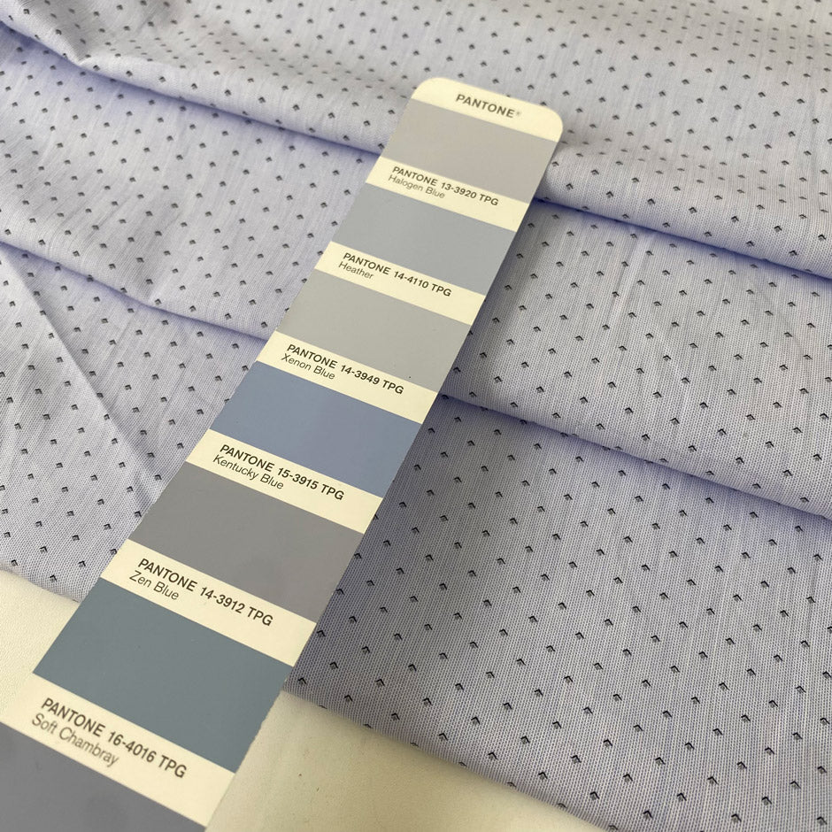 Pure cotton in light blue with a small geometric design, color reference Heather. Very soft and light, not transparent. Ideal for shirting, dresses, or skirts. High-quality deadstock collected in Stock from a Maison de Couture in Italy.