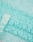 Light blue water lace polyamide and viscose. Transparent and falling. High-quality deadstock fabric collected in Stock from a Maison de Couture in Italy.