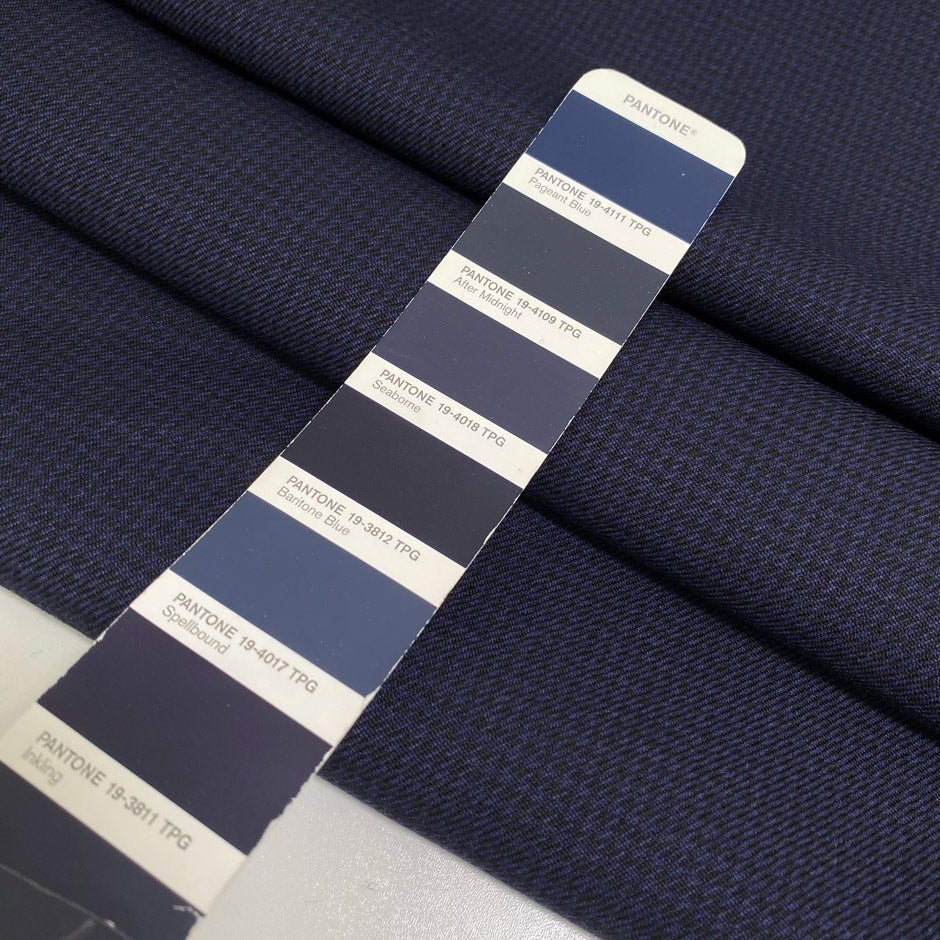 Pure virgin wool in dark blue with a tiny pied de poule pattern. Slightly stiff, perfect for structured jackets and skirts.High-quality deadstock collected in Stock from a Maison de Couture in Italy.