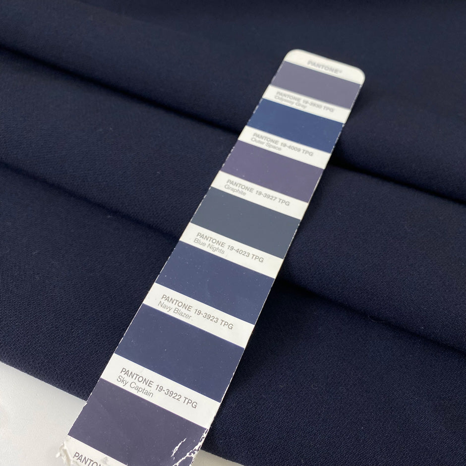 Heavy and flowing wool blend with stretch in dark blue. Ideal for structured yet elegant skirts, trousers, jackets, and dresses.High-quality deadstock collected in Stock from a Maison de Couture in Italy.