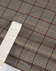 Prince Of Wales Rigid Pure Wool. High-quality deadstock fabric collected in Stock from a Maison de Couture in Italy.