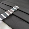 Pure cotton fabric in smoked pearl gray, with a crunchy hand and stiff structure, ideal for sculptural pieces, shirts, and outerwear. High-quality deadstock collected in Stock from a Maison de Couture in Italy.