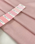 Pure cotton popline in baby pink color, very soft and light. High-quality deadstock fabric collected in Stock from a Maison de Couture in Italy.